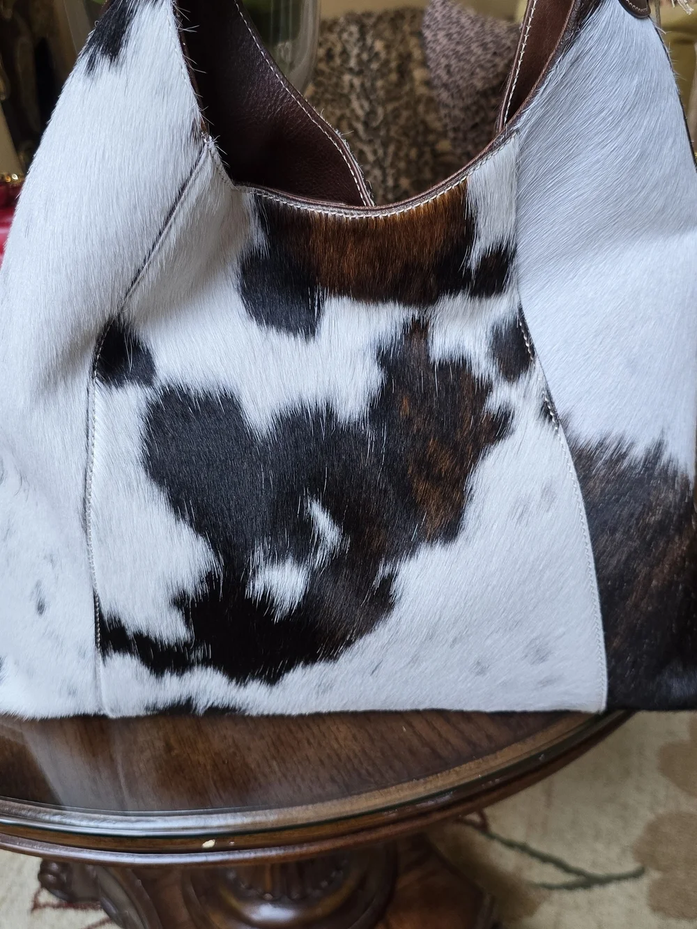 Cowhide Calvacanti Shoulder Tote in White and Chocolate Brown.